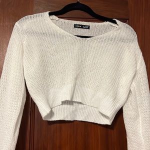 Cropped white knitted sweater